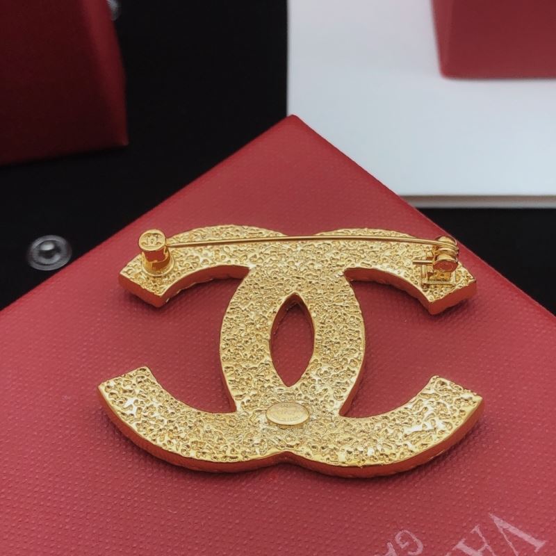 Ch**el brooches